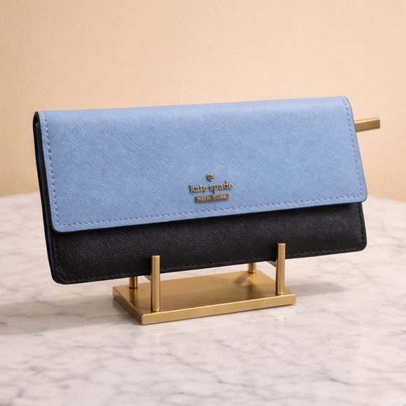 kate spade Handbags - Kate Spade Two-Tone Blue and Black Wallet With Signature Striped Interior.